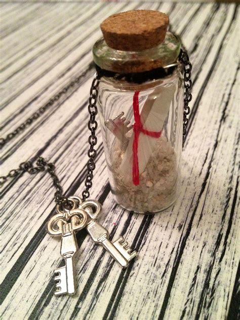 Pin By Casey Phillips On Diy Decor Bottle Charms Bottle Jewelry Diy
