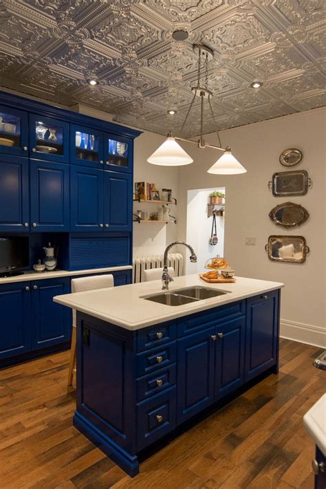 Design your kitchen from top to bottom by highlighting your fifth wall with tin ceiling tiles. 8 Shining Examples of Tin Tiles in the Kitchen | Ceiling ...