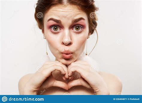 pretty woman with surprised facial expression naked shoulders cosmetics fashion stock image