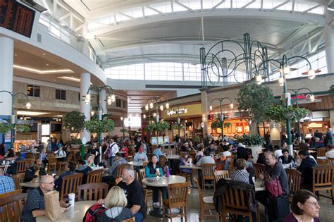 Our seattle airport guide contains information about airport lounges, wifi, nearby hotels, hours of operation, facilities and things to do on a layover. Travelers Dining At Food Court In Seattletacoma ...