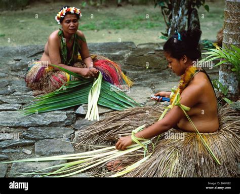 Women Teaching Girl To Prepare Areca Palm Leaves For Skirts Yap