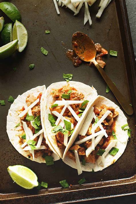 Shred chicken with 2 forks; Crockpot Chicken Tacos • Low Carb with Jennifer