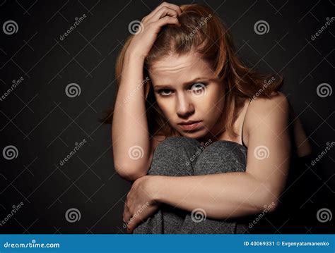 Woman In Depression And Despair Crying On Black Dark Stock Image