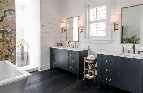 Get all of your bathroom supplies organized and stored with a new bathroom cabinet. 20 Gorgeous Black Vanity Ideas for a Stylishly Unique Bathroom