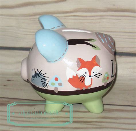 The beautifully hand painted details on this piggy bank make it a truly one of a kind heirloom piece that your child will treasure forever. Alphadorable: Custom hand painted piggy bank to match ...