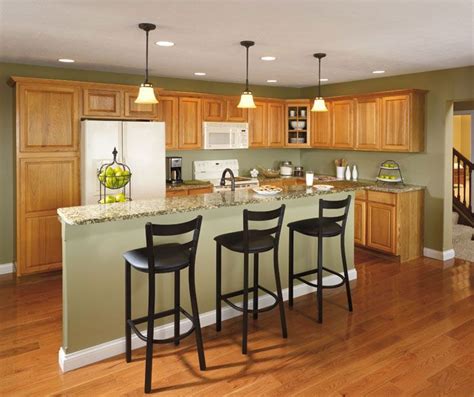 With gray there is a shade that works with nearly any backsplash or granite color. Hickory Kitchen Cabinets--green gray walls? | Green ...