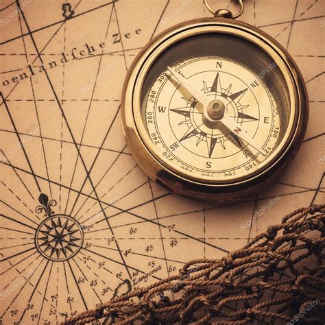 Compass On Vintage Map Stock Photo By ©korovin 59983591