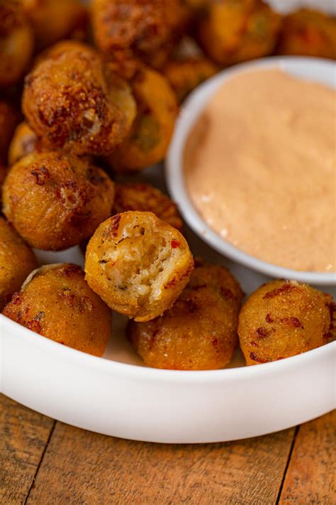 I first saw these copycat texas roadhouse rolls at my friend aimee's blog, and was super impressed at how perfectly square/rectangle they were.i was almost too intimidated to try them myself even though i have a lot of baking experience. Texas Roadhouse Rattlesnake Bites (Copycat) Recipe ...