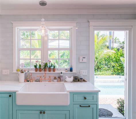 Light above kitchen sink jscott interiors lighting ideas for over. Custom Kitchen with Turquoise Cabinets - Home Bunch Interior Design Ideas