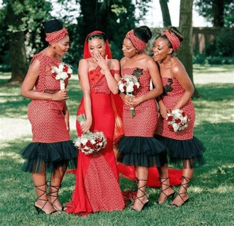 clipkulture tswana bride and bridesmaids in beautiful red and black shweshwe dresses african