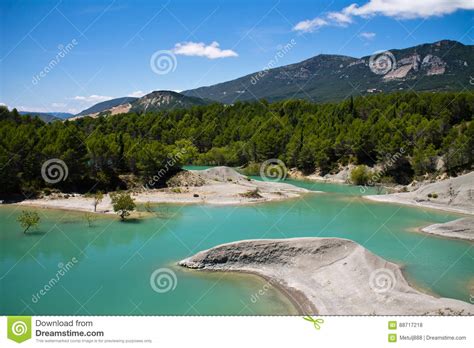 Sightseeing Wonderful View On Artificial Turquoise Lake And Trees In