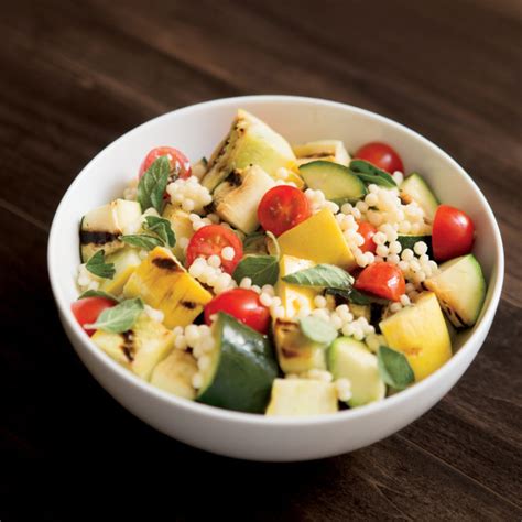 Gently stir in roasted tomatoes and parsley. Summer Couscous Salad with Grilled Squash and Tomatoes ...