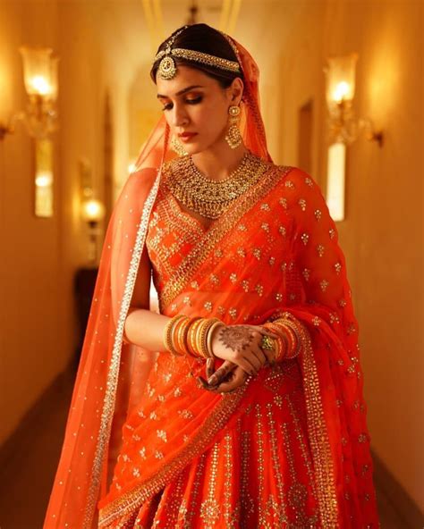 Kriti Sanon Shines Bright In Orange Wedding Lehenga See The Divas Gorgeous Bridal Photoshoots