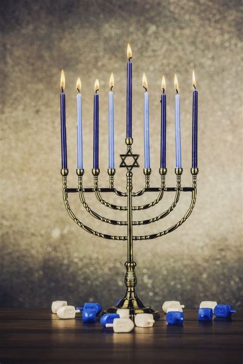 A Hanukkah Menorah With Blue Candles And Marshmallows