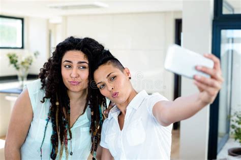 Lesbian Couple Taking A Selfie On Phone Stock Image Image Of