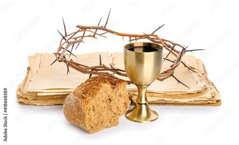 Holy Bible With Chalice Of Wine Bread And Crown Of Thorns On White