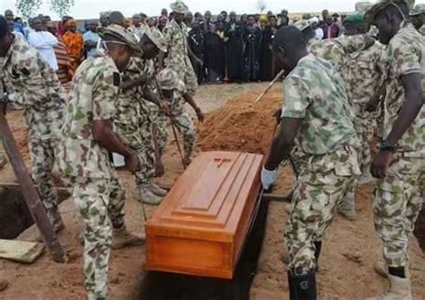Photos From The Mass Burial Of Nigerian Soldiers Killed By