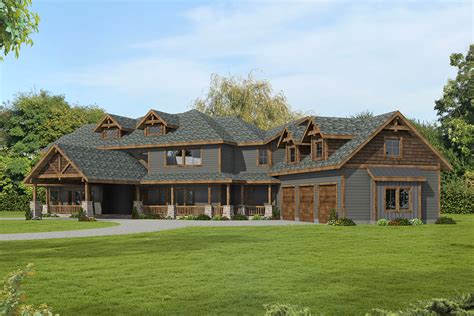 This Two Story Mountain Craftsman Home Plan Is Surrounded By Loads Of