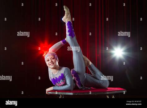 A Girl With A Flexible Body Performs A Circus Artist Circus Gymnast