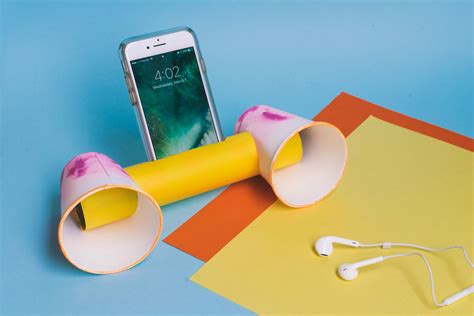 Put your phone in a glass to make the music loud enough to fill the room. DIY Phone Speaker