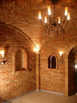 There are interior partition walls on either side that the barrell vault ceiling rafters. Brick Vaulted Ceilings | Taraba Home Review