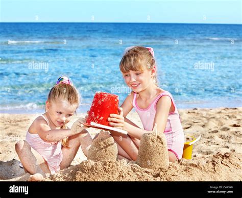Children Playing On Beach Near Sea Stock Photo Alamy