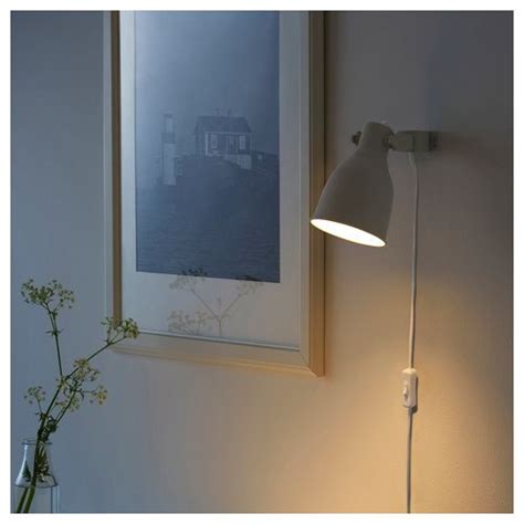 Though on the smaller side, these lamps are a good budget option for a guest bedroom or transitional decor. IKEA | HEKTAR veggljós/kastari drappað | Wall spotlights ...