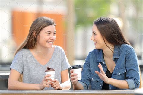 Two Friends Talking And Drinking In High Quality Food Images