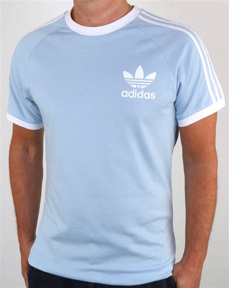Originals is anchored by iconic looks, like the superstar, and high profile collaborations with the likes of pharrell williams and kanye west. Adidas Originals T Shirt Sky,3 stripe,retro, california ...