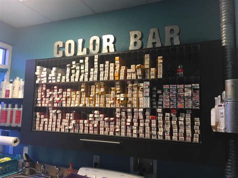 Home has 3 bedrooms and 2 bathrooms and features laminate flooring and carpet in the bedroom. Color Bar - Carlie's Cutting Edge Salon