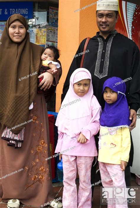 Malay Family Outside The Geylang Market Singapore Stock Photo Picture And Rights Managed