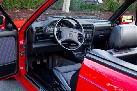 Live Out Your 90s Wall Street Broker Dreams With This Brilliant Red E30