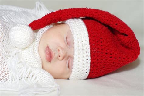Lovely Sleeping Baby In New Year S Hat Among Spangle Stock Photo