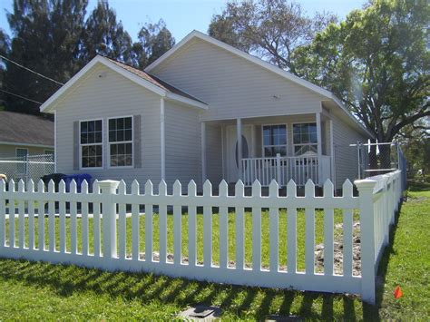 A White Picket Accent Fence Is The Perfect Way To Add Charm And Curb