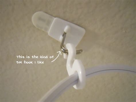 How to install a ceiling hook: Girl Meets Apartment: How To Easily Install a Hanging ...