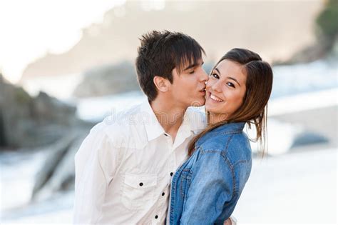 Select from premium teenage couple of the highest quality. Cute Teen Couple In Love On Beach. Stock Image - Image of ...