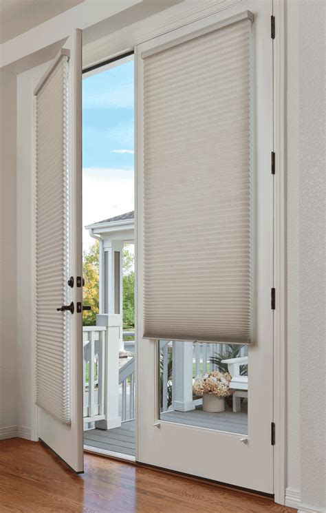 Patio door blinds and sliding door blinds are versatile, allowing complete privacy when closed and a full view when opened. glass-door-window-treatments-duette-shades-french-doors ...