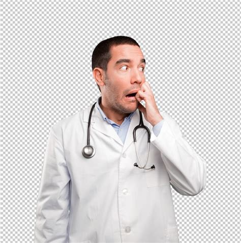 Premium Psd Scared Young Doctor Posing