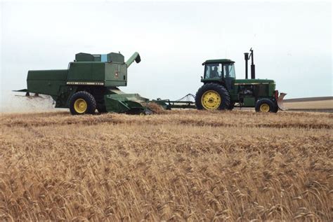 John Deere 4440 And 6601 Pull Type Combine Farming Tractors