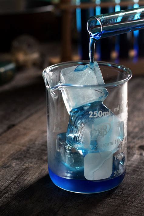 Concept meaning touching, breathing, eating or drinking harmful chemicals magnifying glass on color envelope and others has same shade. Evil Drink Lab - HonestlyYUM