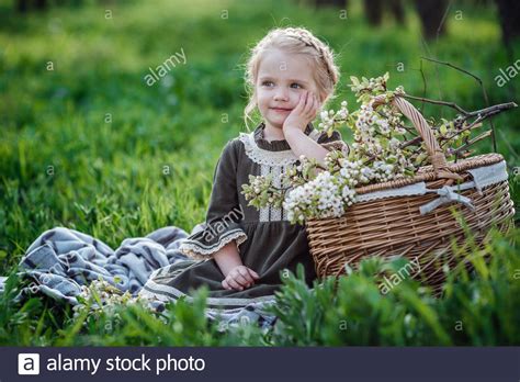 Small Cute Girl In Dress In Blossom Garden Cute Baby Girl 3 4 Year Old
