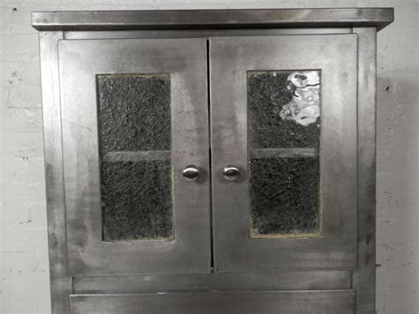 Maybe you would like to learn more about one of these? Tall Mid Century Modern Metal Cabinet at 1stdibs