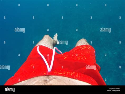 Man Floating In Sea Water Stock Photo Alamy