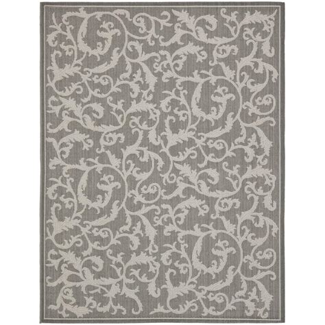 Without a pad, foot traffic will quickly diminish the ability of the fibers to spring back after being stepped on material: Safavieh Courtyard Anthracite/Light Gray 9 ft. x 12 ft ...