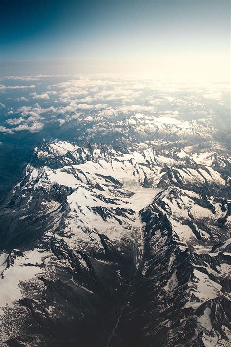 Mountains Aerial View Snowy Peaks Clouds Sky Hd Phone Wallpaper
