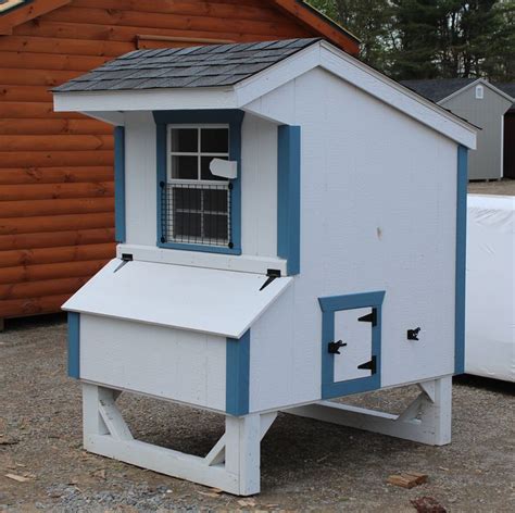 4×8 backyard chicken coop plans. Painted chicken coop with easy egg collection system ...