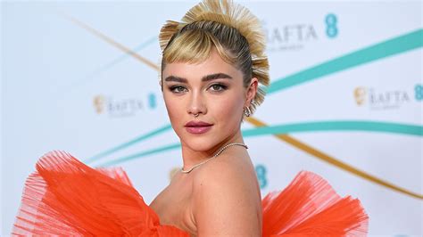 baftas 2023 florence pugh stuns in bright orange see through gown after surprise lfw runway