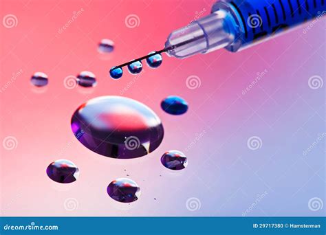 Syringe Needle With Fluid Drops Stock Photo Image Of Blue Still