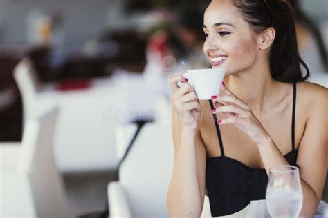 Beautiful Woman Drinking Coffee In Restaurant Stock Photo Image Of