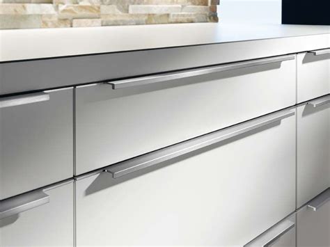 I also brought a normal ikea front to use as a template for cutting the right dimension. I like the handles. Kitchen drawers have discreet aluminium handle strips in stainless st ...